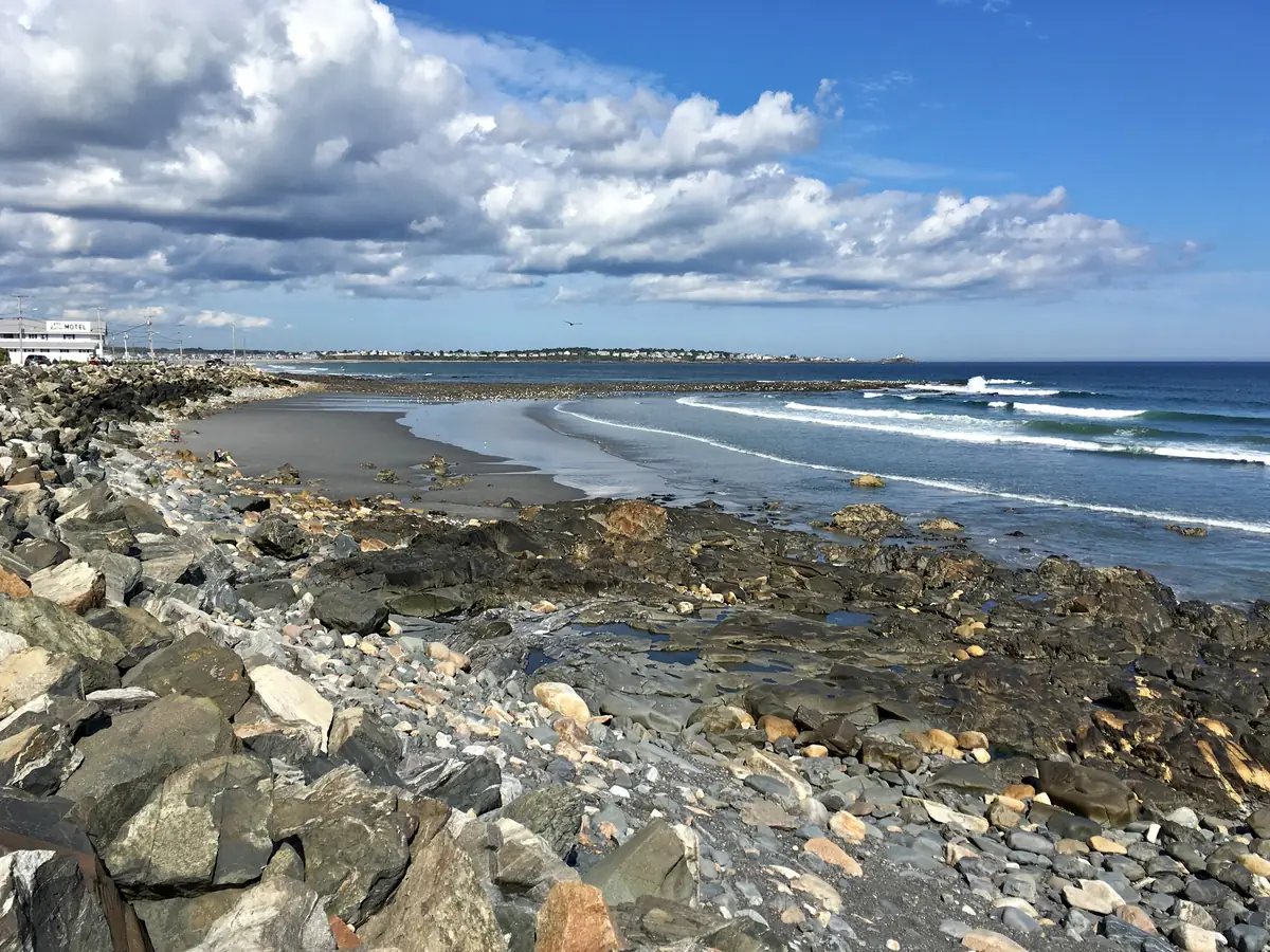 Rocks and surf along Long Sands Beach, York, Maine